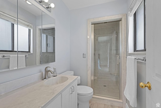 2137 W 550 N, West Point, UT 84015 - full bath featuring vanity, toilet, plenty of natural light, and a stall shower