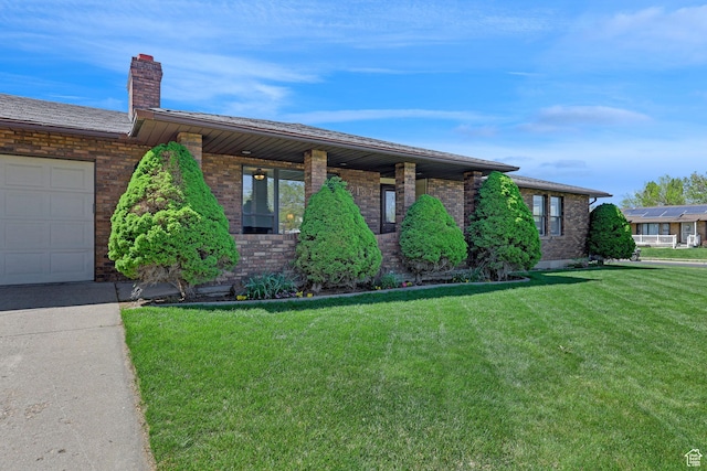 2137 W 550 N, West Point, UT 84015 - ranch-style house featuring brick siding, a garage, a front yard, and a chimney