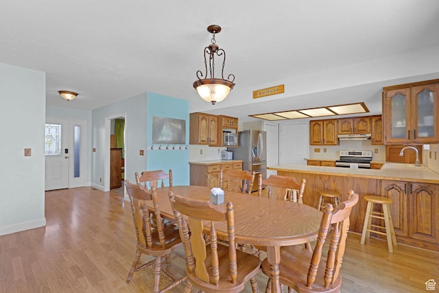 2137 W 550 N, West Point, UT 84015 - dining space with baseboards and light wood-style flooring