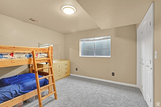 2137 W 550 N, West Point, UT 84015 - bedroom with visible vents, a textured ceiling, carpet, and baseboards