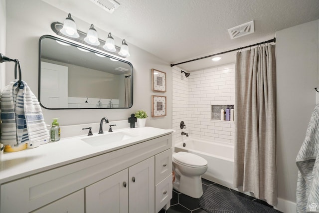 bathroom featuring shower / bath combo with shower curtain, toilet, visible vents, and vanity