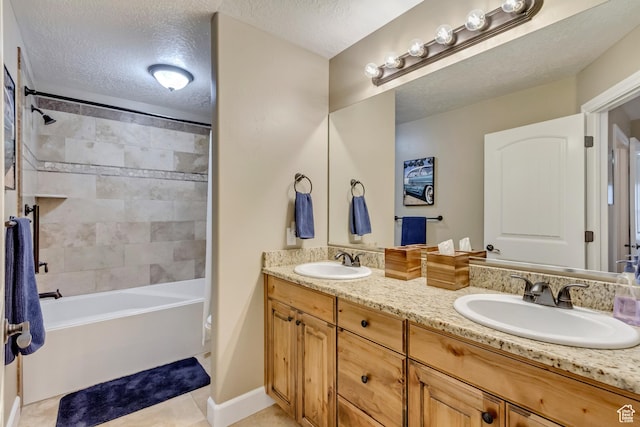 1155 S 2880 E, Spanish Fork, UT 84660 - bathroom with double vanity, a sink, a textured ceiling, and tile patterned flooring