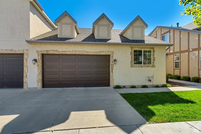 1155 S 2880 E, Spanish Fork, UT 84660 - multi unit property with a shingled roof, an attached garage, stucco siding, a front yard, and driveway