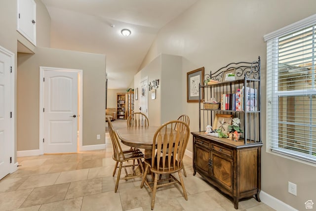 1155 S 2880 E, Spanish Fork, UT 84660 - dining space with light tile patterned floors, baseboards, and lofted ceiling