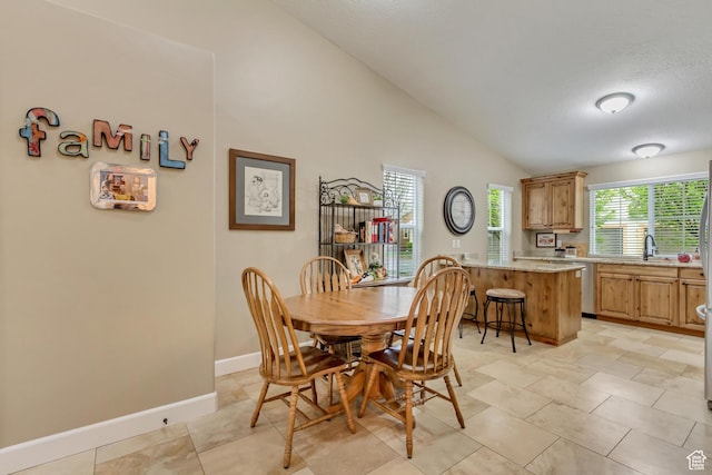 1155 S 2880 E, Spanish Fork, UT 84660 - dining space with baseboards, a textured ceiling, and lofted ceiling