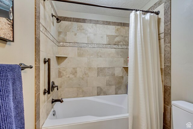 1155 S 2880 E, Spanish Fork, UT 84660 - full bathroom featuring a textured ceiling, shower / bath combo, and toilet