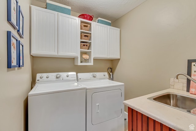 1155 S 2880 E, Spanish Fork, UT 84660 - washroom with cabinet space, independent washer and dryer, a textured ceiling, and a sink