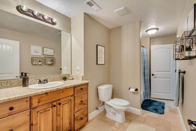 1155 S 2880 E, Spanish Fork, UT 84660 - full bathroom with vanity, a textured ceiling, visible vents, and toilet