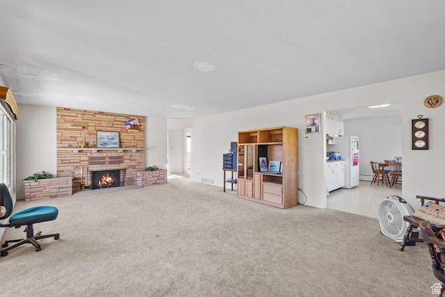 1745 Old Ranch Rd, Park City, UT 84098 - living room featuring visible vents, carpet flooring, and a stone fireplace