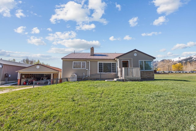 1745 Old Ranch Rd, Park City, UT 84098 - rear view of property with a lawn, a mountain view, fence, and a chimney