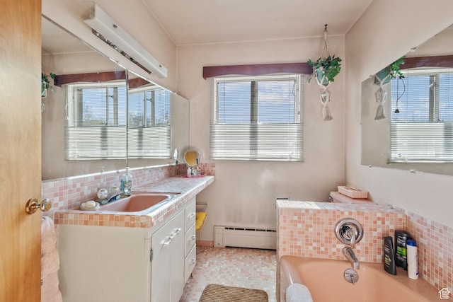 1745 Old Ranch Rd, Park City, UT 84098 - full bathroom with a baseboard heating unit, a wealth of natural light, a bath, and tasteful backsplash
