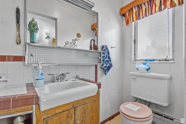 1745 Old Ranch Rd, Park City, UT 84098 - bathroom featuring backsplash, toilet, baseboard heating, and vanity