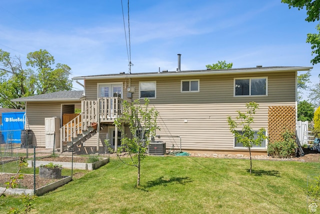 222 N 600th St E, Orem, UT 84097 - rear view of house featuring a garden, central AC unit, fence, a yard, and stairs