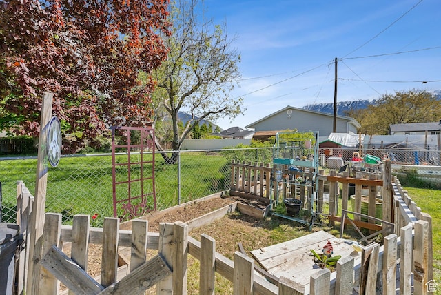 222 N 600th St E, Orem, UT 84097 - view of yard featuring a garden and fence