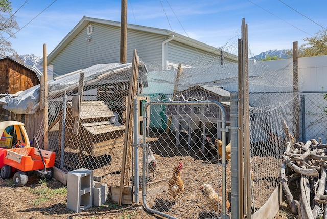 222 N 600th St E, Orem, UT 84097 - view of home's exterior with an outdoor structure, exterior structure, and fence
