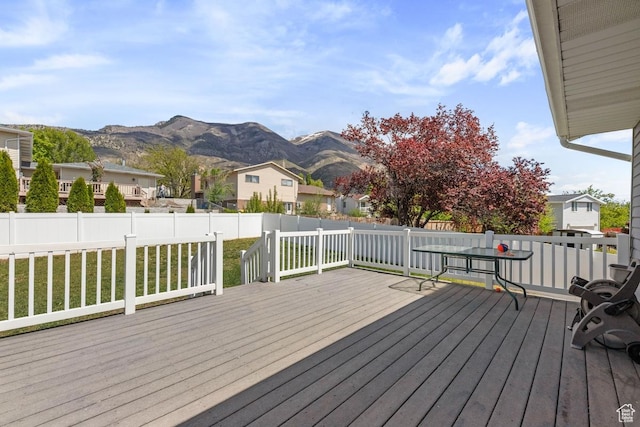10046 N Sage Rd W, Cedar Hills, UT 84062 - wooden terrace featuring a lawn, fence, a mountain view, and a residential view
