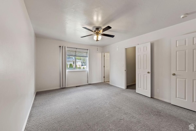 10046 N Sage Rd W, Cedar Hills, UT 84062 - unfurnished bedroom with a ceiling fan, baseboards, and carpet