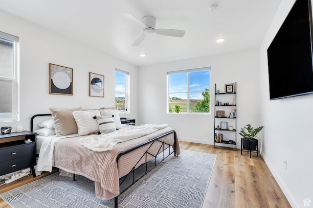 6294 W 7830 S, West Jordan, UT 84081 - bedroom featuring baseboards, a ceiling fan, light wood-style flooring, and recessed lighting