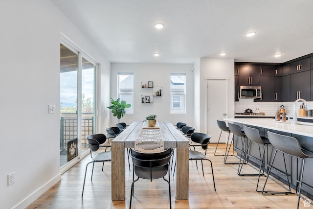 6294 W 7830 S, West Jordan, UT 84081 - dining area featuring recessed lighting, baseboards, and light wood-style flooring