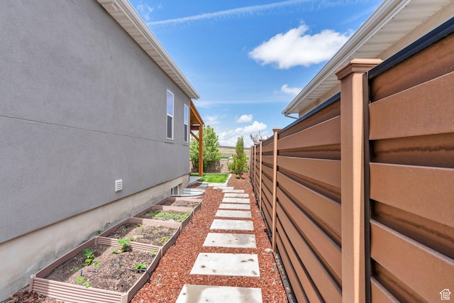 6294 W 7830 S, West Jordan, UT 84081 - view of yard featuring a garden and fence