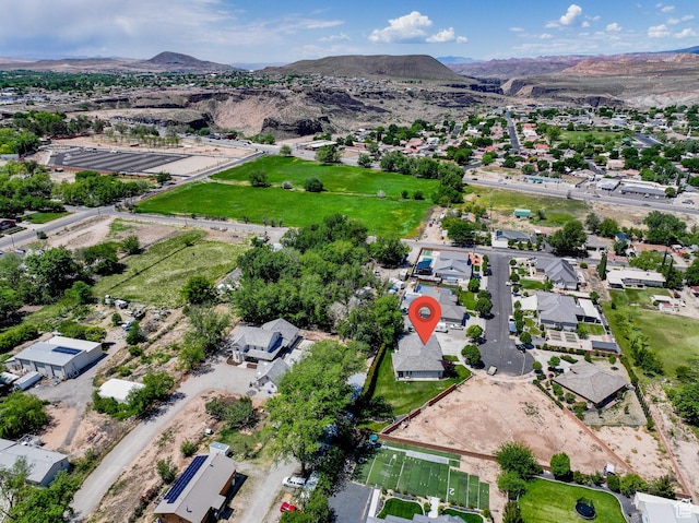 birds eye view of property with a residential view and a mountain view