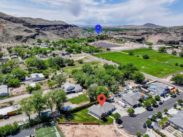 drone / aerial view featuring a mountain view