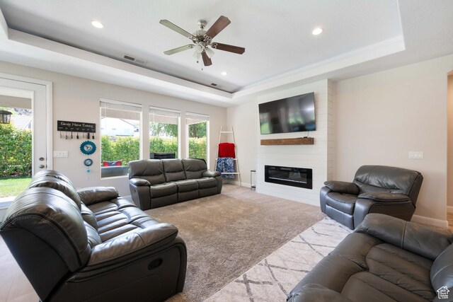 57 W 180 S, La Verkin, UT 84745 - living room featuring ceiling fan, a fireplace, recessed lighting, a tray ceiling, and visible vents
