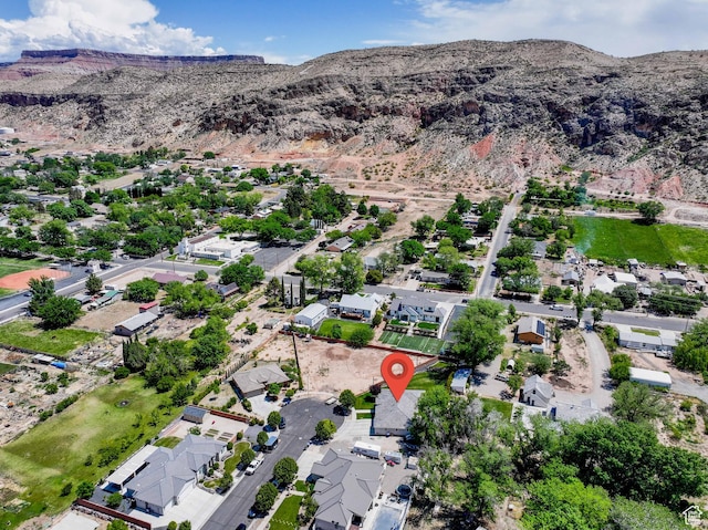 aerial view featuring a mountain view and a residential view