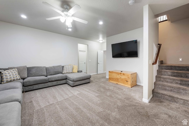 living area with a ceiling fan, stairs, baseboards, carpet flooring, and recessed lighting