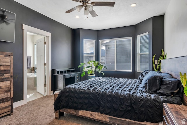 289 W Lauren N, Tooele, UT 84074 - bedroom with a ceiling fan, baseboards, ensuite bathroom, carpet flooring, and recessed lighting