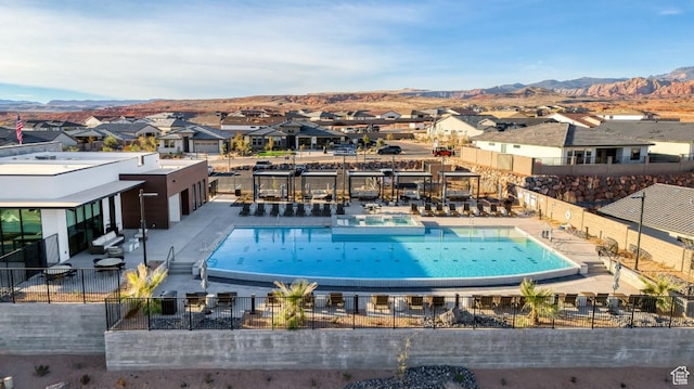 1490 N Daylight St Unit 94, Washington, UT 84780 - pool with fence, a residential view, and a mountain view
