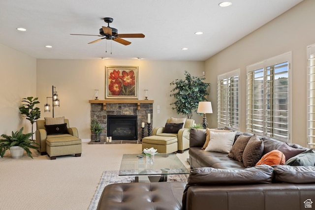 living room featuring a fireplace, carpet flooring, a ceiling fan, and recessed lighting
