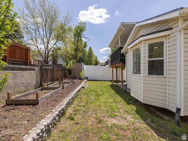 7123 S Watermill Way, Cottonwood Heights, UT 84121 - view of yard with a fenced backyard and a garden