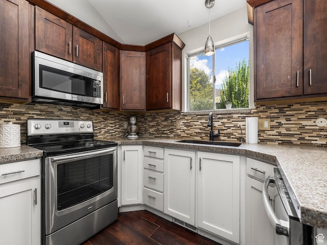7123 S Watermill Way, Cottonwood Heights, UT 84121 - kitchen featuring a sink, appliances with stainless steel finishes, decorative backsplash, and dark wood-type flooring