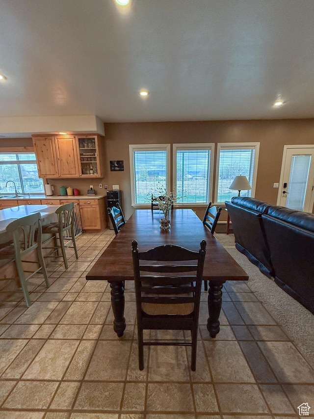 dining room featuring recessed lighting and plenty of natural light
