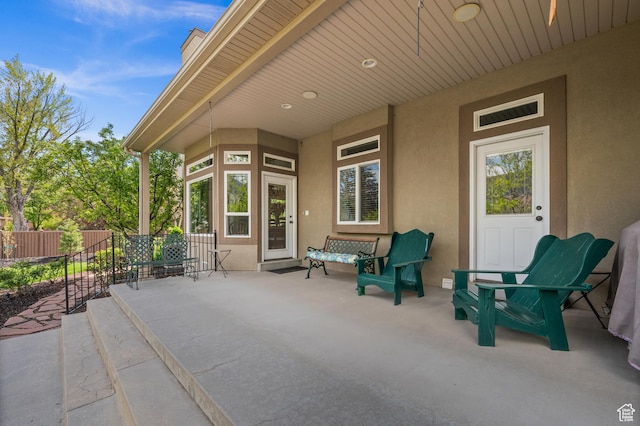 view of patio / terrace with fence