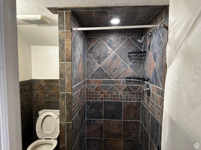 5160 S 200 E, Washington Terrace, UT 84405 - full bathroom with tile walls, a stall shower, and toilet