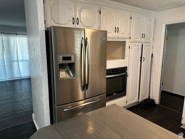 5160 S 200 E, Washington Terrace, UT 84405 - kitchen featuring stainless steel appliances, white cabinets, dark wood-style flooring, and a textured ceiling