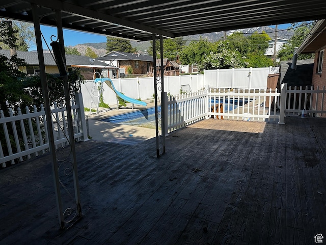 5160 S 200 E, Washington Terrace, UT 84405 - wooden terrace featuring a fenced backyard and a patio