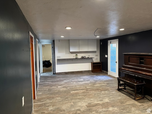 5160 S 200 E, Washington Terrace, UT 84405 - kitchen with wood finished floors, baseboards, recessed lighting, and dark countertops