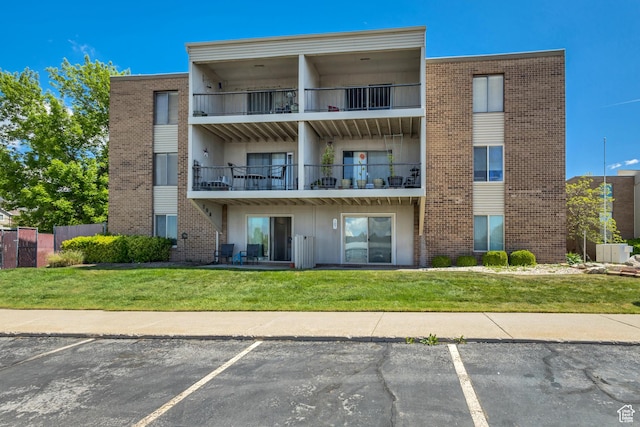 view of property with uncovered parking