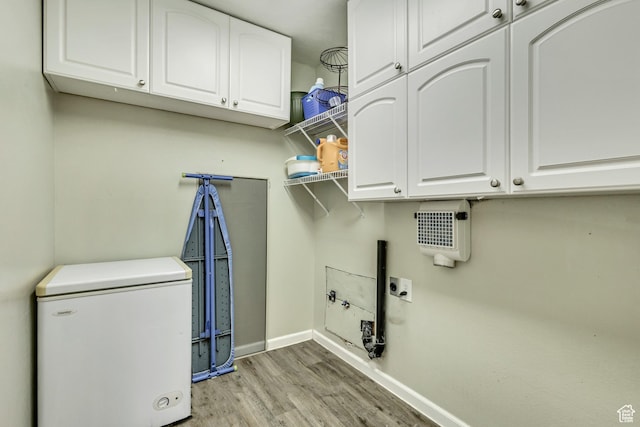 290 N 500 W Unit 108, Bountiful, UT 84010 - washroom with cabinet space, baseboards, electric dryer hookup, and wood finished floors