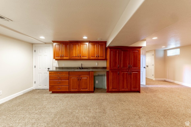 81 S 700 E, Bountiful, UT 84010 - kitchen featuring visible vents, baseboards, recessed lighting, light colored carpet, and a sink
