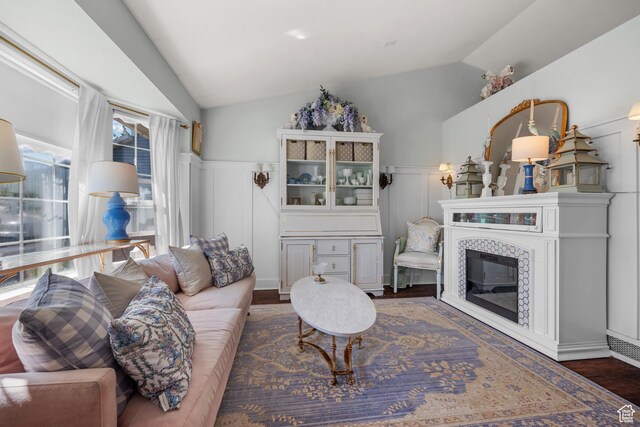 5472 W Aristada Ave S, West Jordan, UT 84081 - living area featuring a decorative wall, wainscoting, wood finished floors, and lofted ceiling