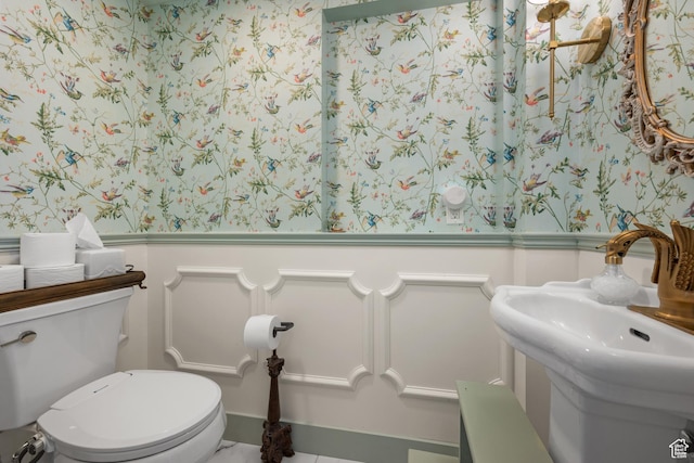 5472 W Aristada Ave S, West Jordan, UT 84081 - half bathroom with toilet, wallpapered walls, wainscoting, and a sink