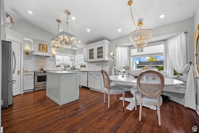 5472 W Aristada Ave S, West Jordan, UT 84081 - kitchen featuring stainless steel appliances, an inviting chandelier, and decorative backsplash