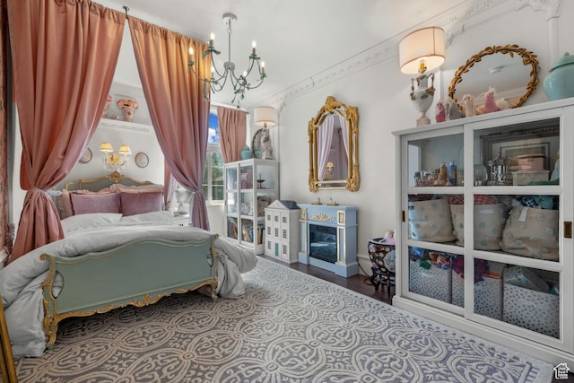 5472 W Aristada Ave S, West Jordan, UT 84081 - bedroom featuring wood finished floors and a notable chandelier