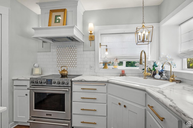 5472 W Aristada Ave S, West Jordan, UT 84081 - kitchen featuring electric range, a sink, a chandelier, premium range hood, and backsplash