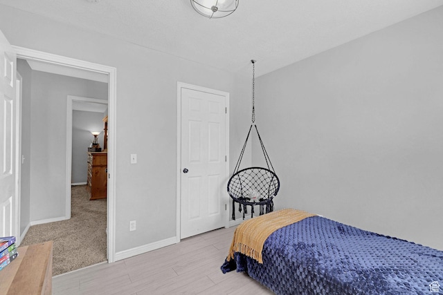 706 E 425 S, Ogden, UT 84404 - bedroom featuring baseboards and light wood-style flooring