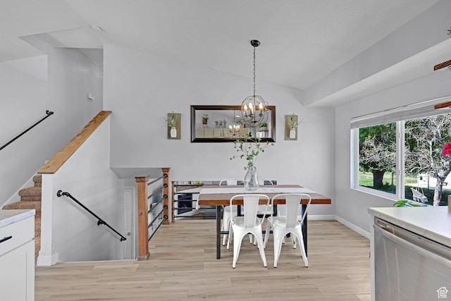 706 E 425 S, Ogden, UT 84404 - dining room with vaulted ceiling, light wood-type flooring, stairway, baseboards, and a chandelier